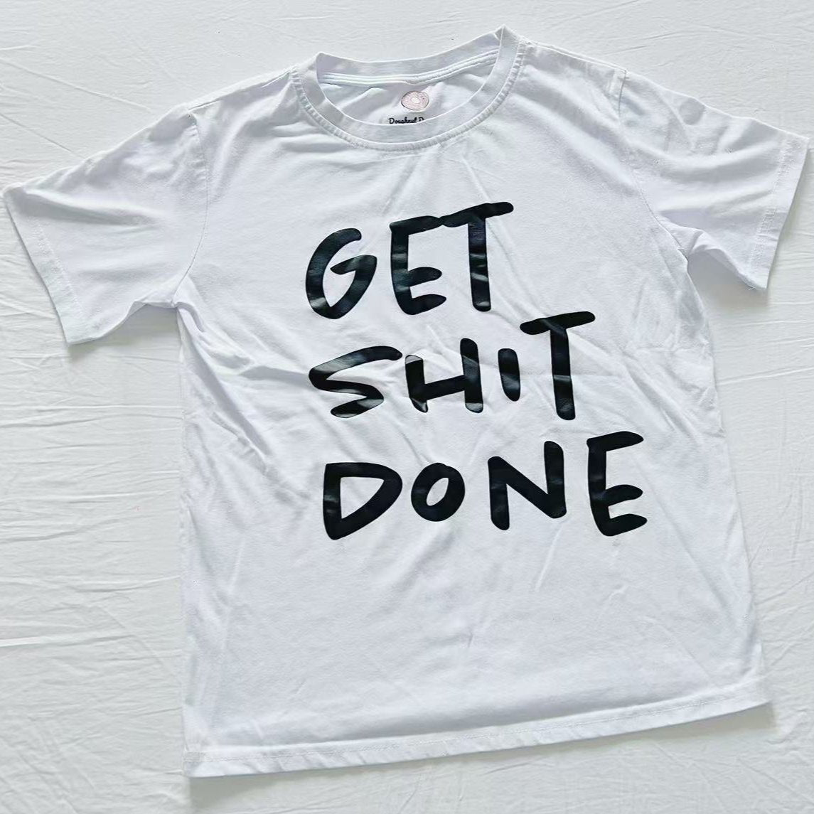 short sleeve white t-shirt with get shit done print